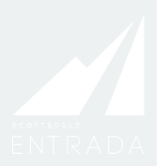 White geometric logo resembling a stylized mountain or arrow above the word "INTEGRAL" on a light background, evoking the serene spirit of Home - Lake Cameron living.